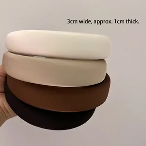 Lot de quatre serre-têtes en éponge de 3 cm de large en blanc, beige, marron et noir