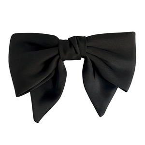 Elegant large black satin bow hair clip with a classic French vintage spring fastener