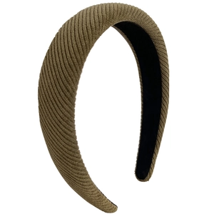 Padded olive green knit headband with thick fabric texture for minimalist hair styling