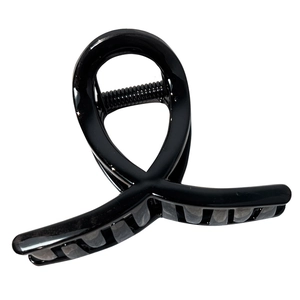 Large black glossy hair claw clip with a minimalist loop design and smooth resin finish