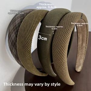 Detail showing 3cm wide fabric padded headbands in various colors and textures