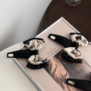 Elegante fermaglio per capelli a fiocco in stile francese con tessuto nero e crema