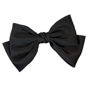 Elegant large black matte satin fabric bow hair clip with a vintage retro Hepburn style