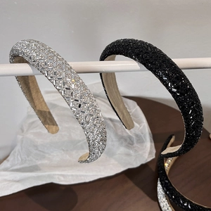 Sparkling crystal rhinestone padded headband in silver and black for retro luxury hair styling