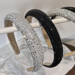Detail of luxury padded headbands with dense rhinestones and anti-slip velvet lining