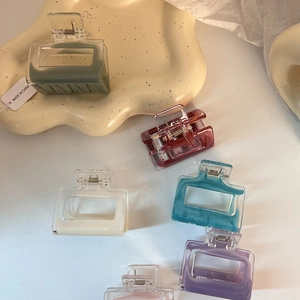 Set of six colorful square hollow hair claws in elegant matte finishes for women