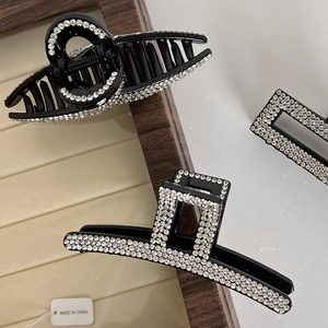 Elegant French style hair claw clips with sparkling rhinestones in black resin finish