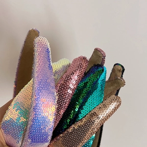Detail of sequined padded headbands showing colorful reflective texture and soft lining