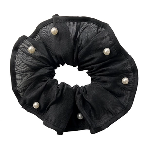 Elegant black organza scrunchie with white pearl accents and elastic hair tie