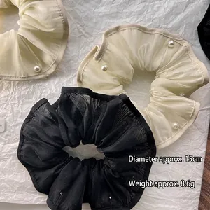 Elegant organza scrunchie with white pearl trim in black and cream beige tones
