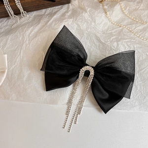 Elegant vintage mesh bow hair clip with sparkling rhinestone fringe for formal occasions