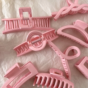 Chic collection of pink geometric shark hair claws for women in various stylish designs