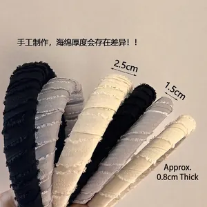 Elegant padded sponge headbands in black, grey and beige with distressed vintage fabric texture