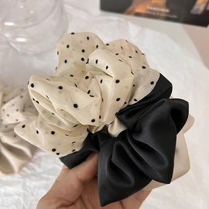 Elegant French style polka dot organza scrunchie with a vintage cream and black contrast