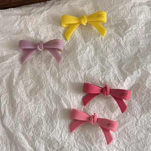 Barrettes à cheveux nœuds brillants avec lettrage doré en rose et couleurs vives