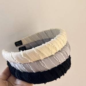 Elegant thick sponge headbands in striped fabric featuring a chic high-top design