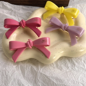 Lot de quatre barrettes à cheveux en forme de nœud roses et jaunes pour femmes
