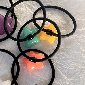 Élastiques à cheveux avec pendentifs étoiles colorés aux nuances acidulées