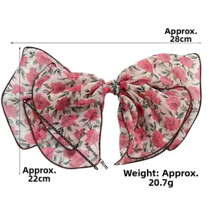 Detailed size measurement of the floral chiffon bow hair clip with 28cm width and 20.7g weight