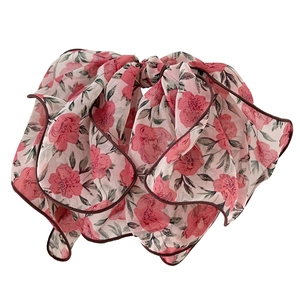 Elegant floral chiffon bow hair clip with vintage pink patterns and rolled edges