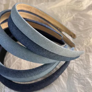Three-pack denim padded headbands in gradient blue shades for a high skull top hairstyle