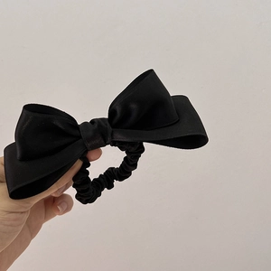 Elegant large black satin bow scrunchie with double-layer design for ponytail styling