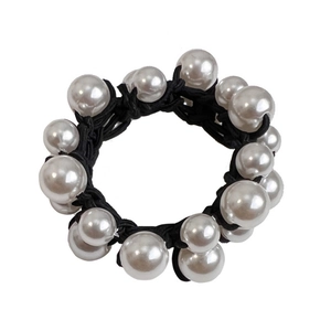 Elegant pearl elastic hair tie featuring black woven fabric and white lustrous pearls