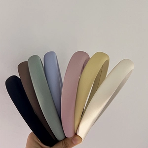 Selection of seven thick Morandi colored headbands with matte soft fabric texture