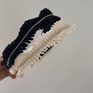 Elegant pleated headband set in black and beige with sparkling rhinestone chains