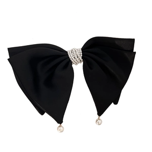 Elegant black satin bow hair clip with pearl beads and hanging pearl charms for women