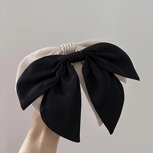 Elegant oversized fabric bow hairband set in matte black and beige grey finishes