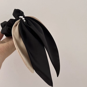 Elegant French bow hair scrunchie with pearls and black-beige ribbons for women