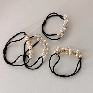 Three-piece hair scrunchie set with faux pearls, gold chains and white flower charms