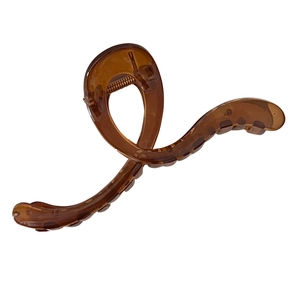 Large amber translucent jelly shark hair claw clip with elegant twist design for women