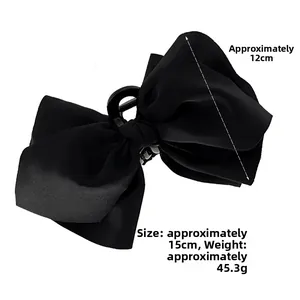 Detailed size view of a 15cm black satin bow hair claw clip with accurate dimensions