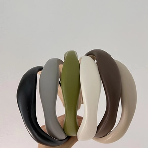 Detailed collection of padded faux leather headbands in six elegant solid neutral colors