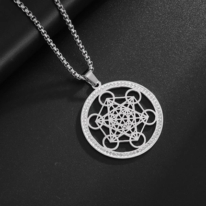 Detail of Metatron's Cube silver pendant with pavé crystals on black leather