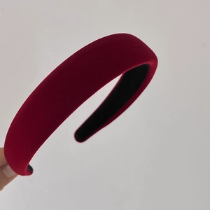 Detail of burgundy velvet padded headband showing premium soft texture and thick sponge foam
