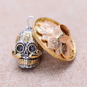 Vintage punk skull pendant with golden sombrero hat and silver mustache detail