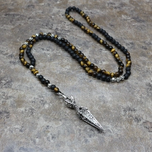 Collier en œil de tigre et pierre de lave avec pendentif vajra argenté pour homme