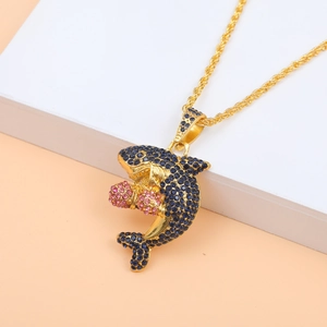 Hip hop shark pendant necklace with blue and pink zircons on a gold rope chain