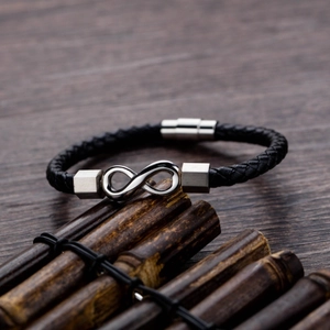 Men's black braided leather infinity bracelet with polished silver magnetic clasp