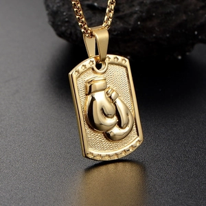 Golden boxing glove dog tag necklace with star trim on a square pearl chain for men