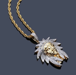 Macro shot of Iced Out Indian chief pendant with rhinestones and rope chain link