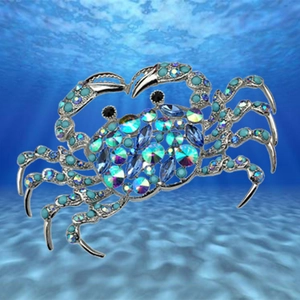 Exaggerated crab brooch with sparkling blue rhinestones and colorful crystals