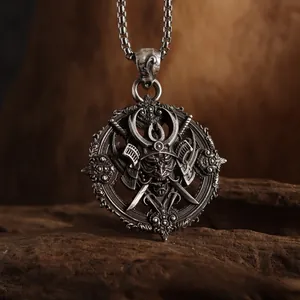 Macro detail of gothic samurai demon pendant with vintage silver oxidized finish