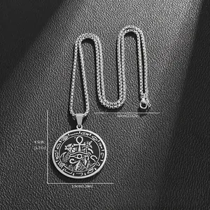 Silver stainless steel Egyptian pyramid and Ankh round pendant necklace on black background