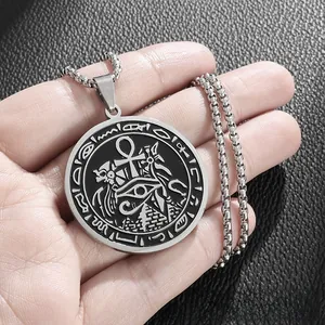 Detailed shot of an Ancient Egyptian pyramid pendant with Ankh and Eye of Horus
