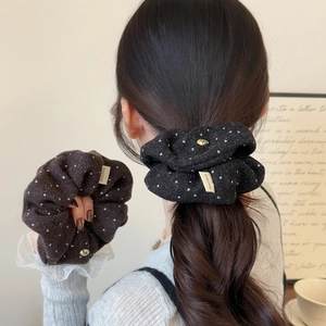 Set of black and brown polka dot velvet scrunchies with gold bow charms and handmade tags