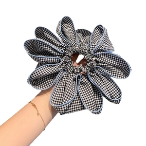 Houndstooth check scrunchie with blue edging for women ponytail or wrist wear